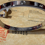 Close-up detail view of Cartier unisex jewelry piece