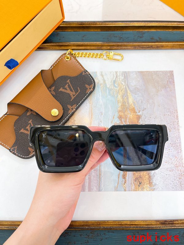 Close-up detail view of Louis Vuitton unisex sunglasses