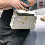 Side view of considered structured handbag