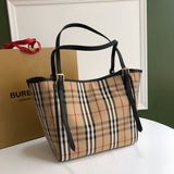 Ziva's Charm handbag – side angle view (one versatile size)