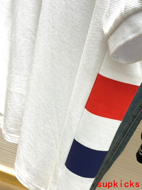 Front view of Moncler luxury clothing with signature branding