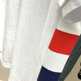 Front view of Moncler luxury clothing with signature branding