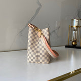 Handle and strap detail of modern chic women's handbag – women's statement bag