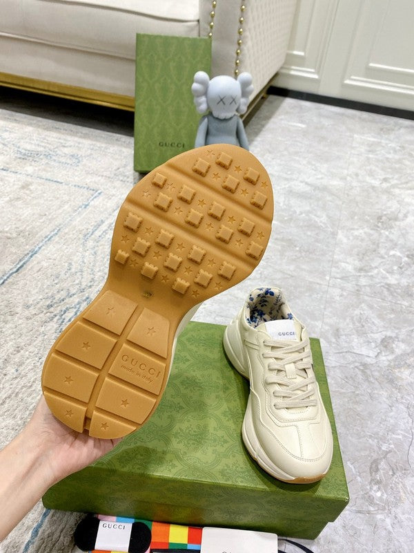 Side profile of Gucci two-tone sneakers breathable knit upper