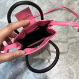 Bold Faux Leather Handbag - Signature Hardware Accents | Women's Fashion Handbag #985 - styled full view (image 7) of designer-inspired handbag