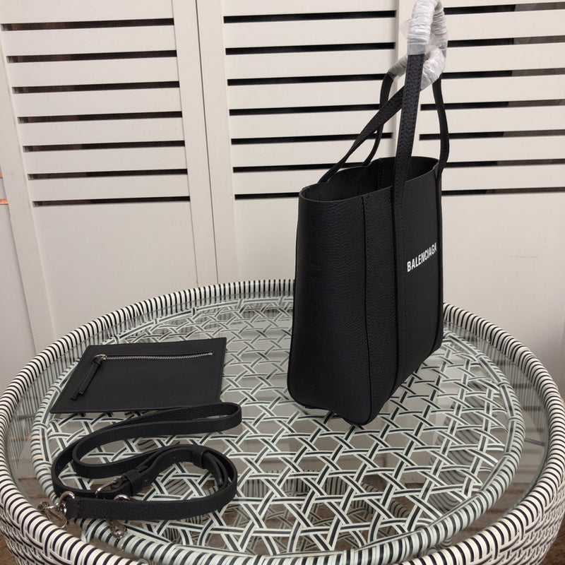 Styled lifestyle shot of sleek premium women's handbag – women's statement bag