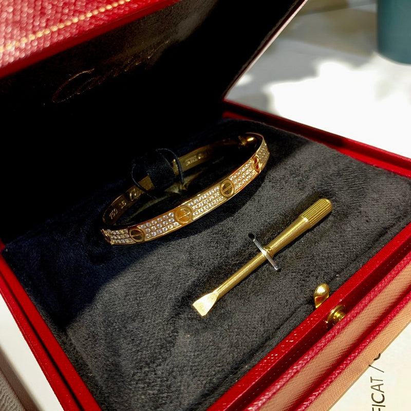 Close-up detail view of Cartier unisex jewelry piece
