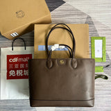 Front view of polished modern women's handbag – women's luxury accessory