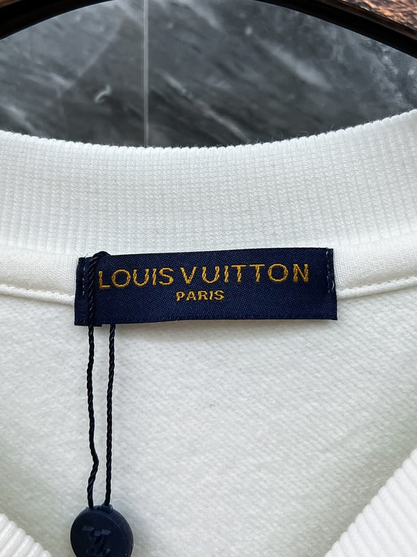 Side profile of Louis Vuitton luxury clothing with tailored silhouette