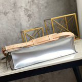 Back view of modern statement women's handbag – women's designer-style accessory