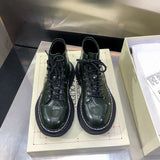 Alexander McQueen shoes Style 289 - close-up of statement logo accent