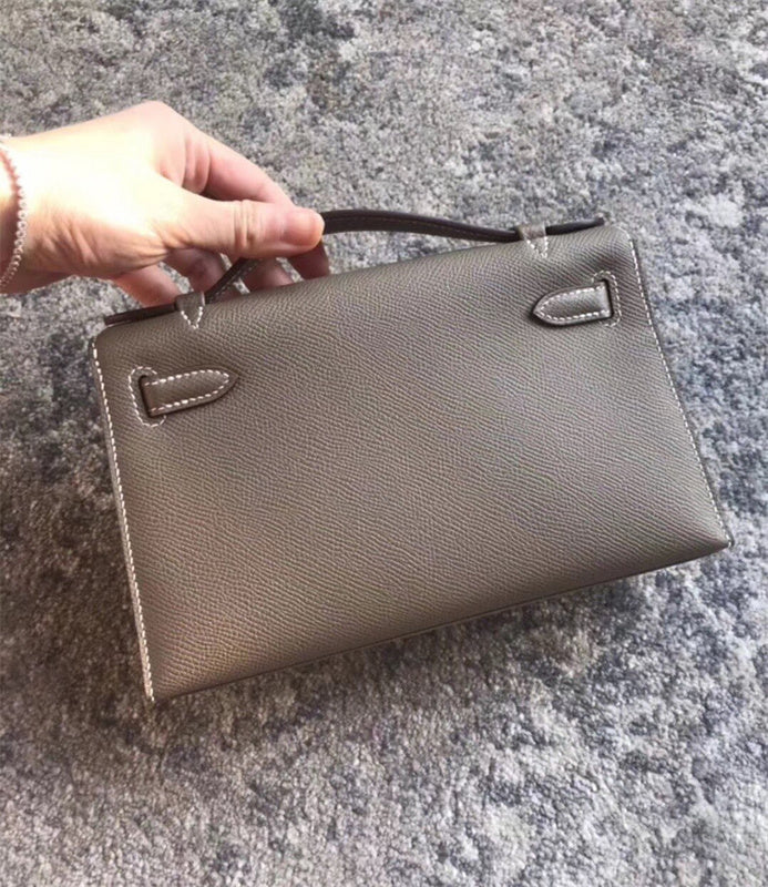  Statement satchel carried on shoulder