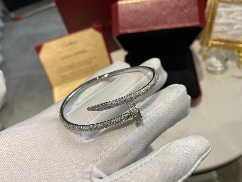 Side view of Cartier unisex jewelry piece