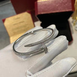 Side view of Cartier unisex jewelry piece