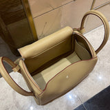 Side view of polished structured handbag