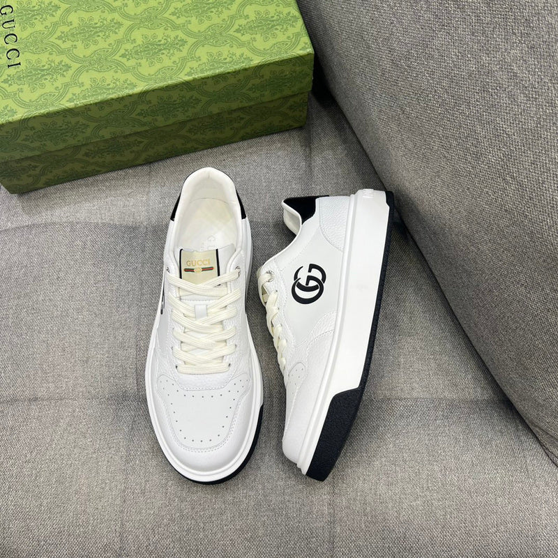 Side profile of Gucci bold contrast sneakers streetwear statement look