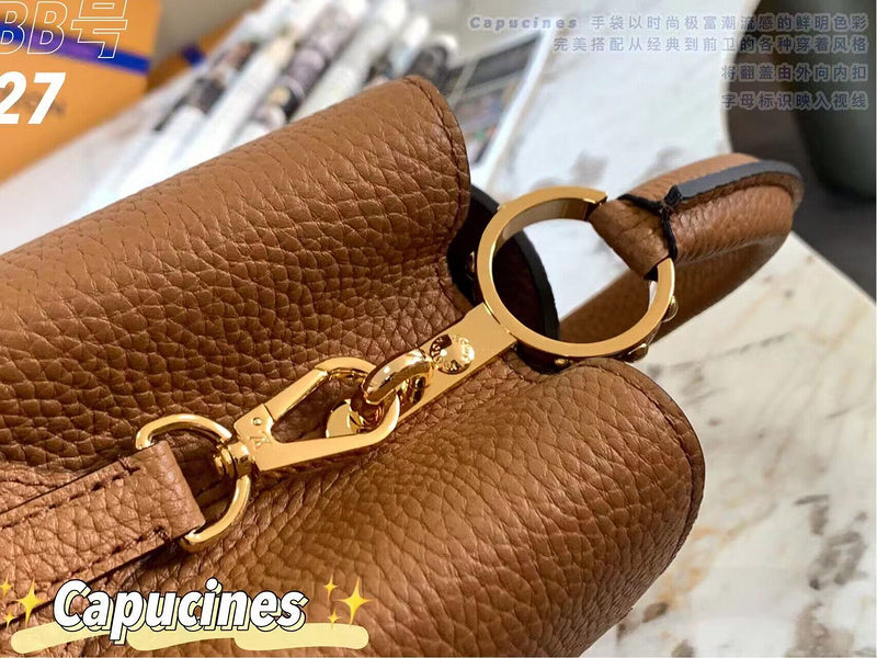 Handle and strap detail of signature statement women's handbag – women's everyday handbag