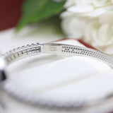 Side view of Cartier unisex jewelry piece