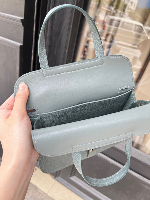 Side view of modernist structured handbag