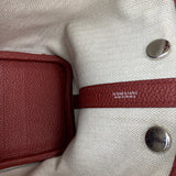 Side view of considered structured handbag