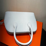  polished satchel detail view showing craftsmanship
