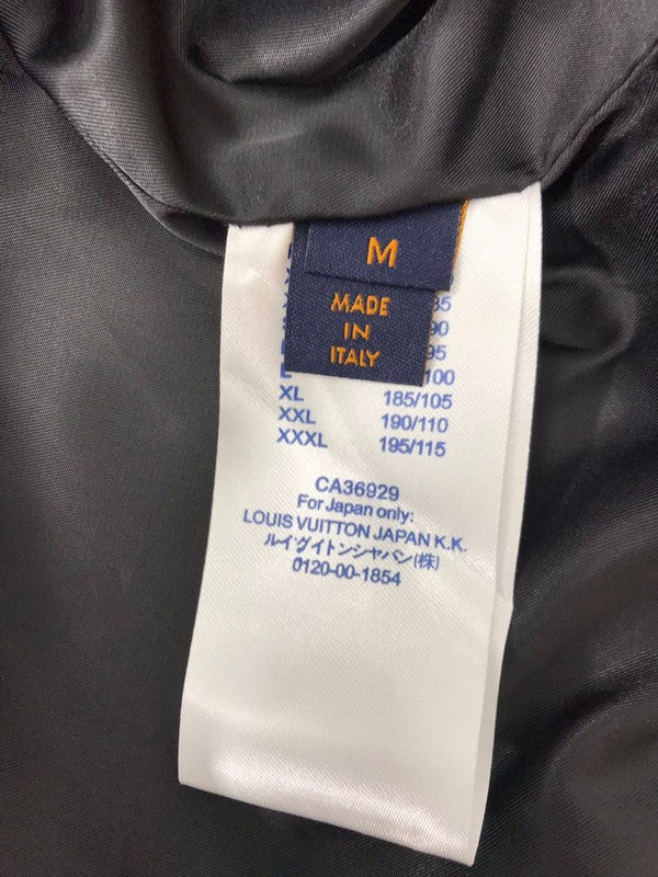 Back view of Louis Vuitton luxury clothing with tailored silhouette