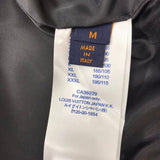 Back view of Louis Vuitton luxury clothing with tailored silhouette