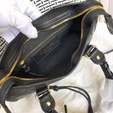 Close-up detail of statement structured women's handbag – women's statement bag