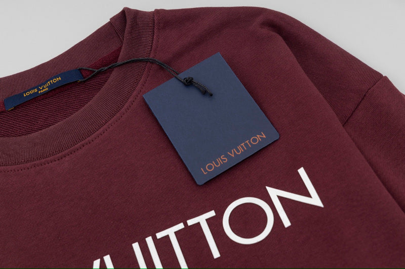 Flat lay presentation of Louis Vuitton luxury clothing with streetwear-inspired cut