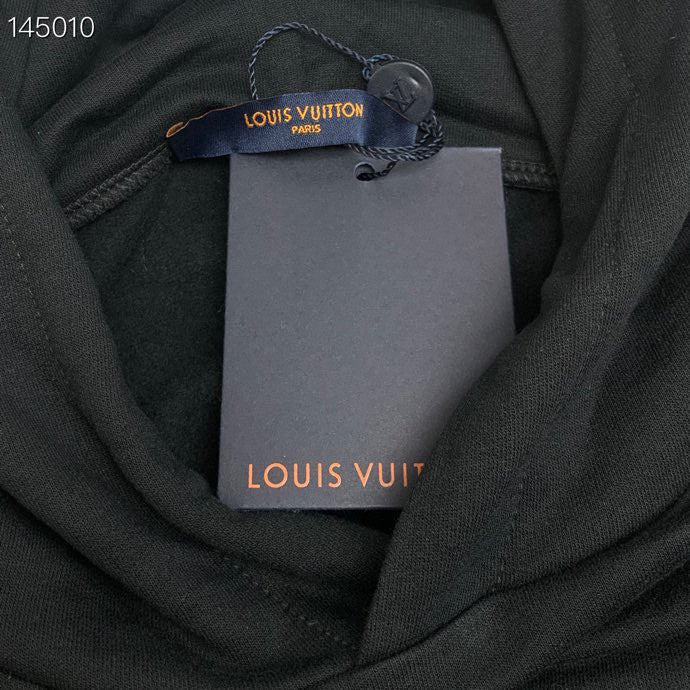 Front view of Louis Vuitton luxury clothing with contemporary cut