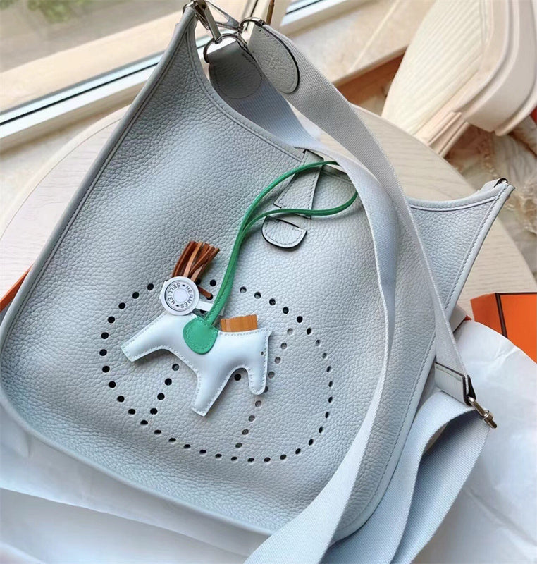  structured top-handle bag styled with outfit 24