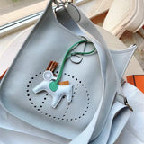  structured top-handle bag styled with outfit 24