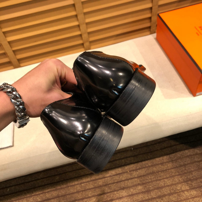 Hermès Black Pointed-Toe Flats - Close-Up Texture View
