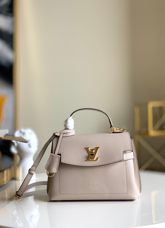 Side profile of modern sleek women's handbag – women's statement bag