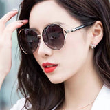 Side view of Cartier unisex sunglasses
