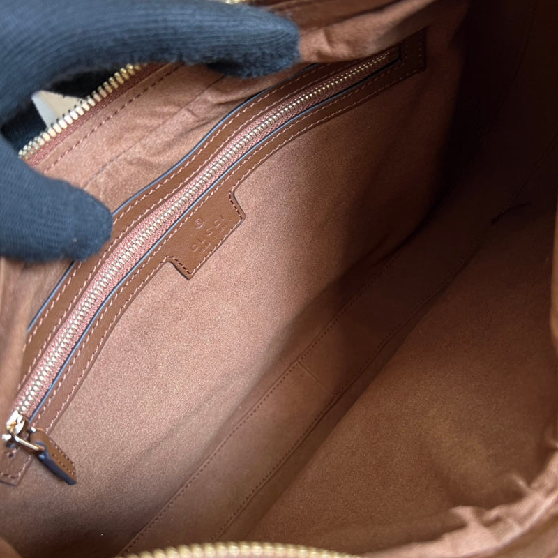 Close-up detail of signature refined women's handbag – women's premium purse