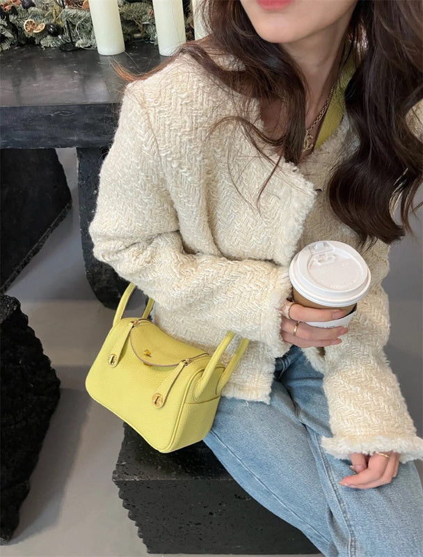 Sleek structured bag carried on shoulder