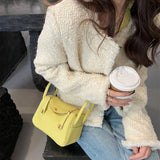  Sleek structured bag carried on shoulder