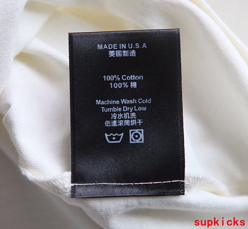 Close-up detail shot of Rhude luxury clothing with monogram-inspired silhouette