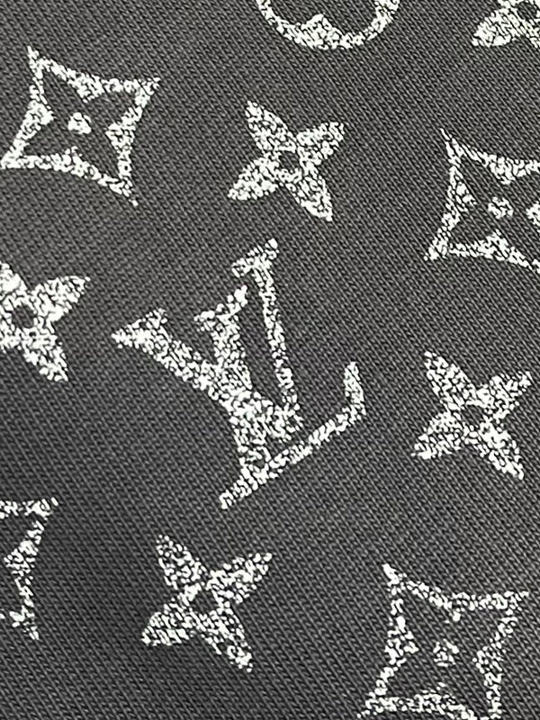 Flat lay presentation of Louis Vuitton cotton t-shirt with logo-detail design