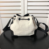 Top view of statement structured women's handbag – women's luxury accessory