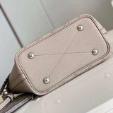 Back view of refined premium women's handbag – women's statement bag