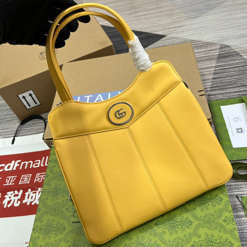 Handle and strap detail of chic signature women's handbag – women's luxury accessory