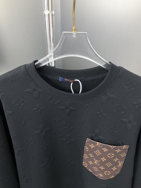 Close-up detail shot of Louis Vuitton luxury clothing with runway-inspired design