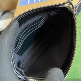 Side profile of everyday-luxe sleek women's handbag – women's luxury accessory