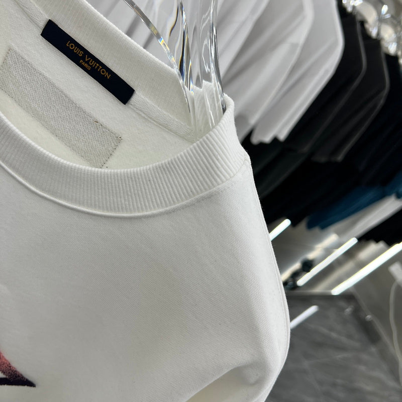 Flat lay presentation of Louis Vuitton luxury clothing with relaxed-fit cut