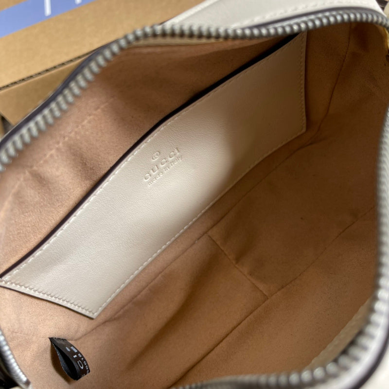 Side profile of statement everyday-luxe women's handbag – women's designer-style accessory
