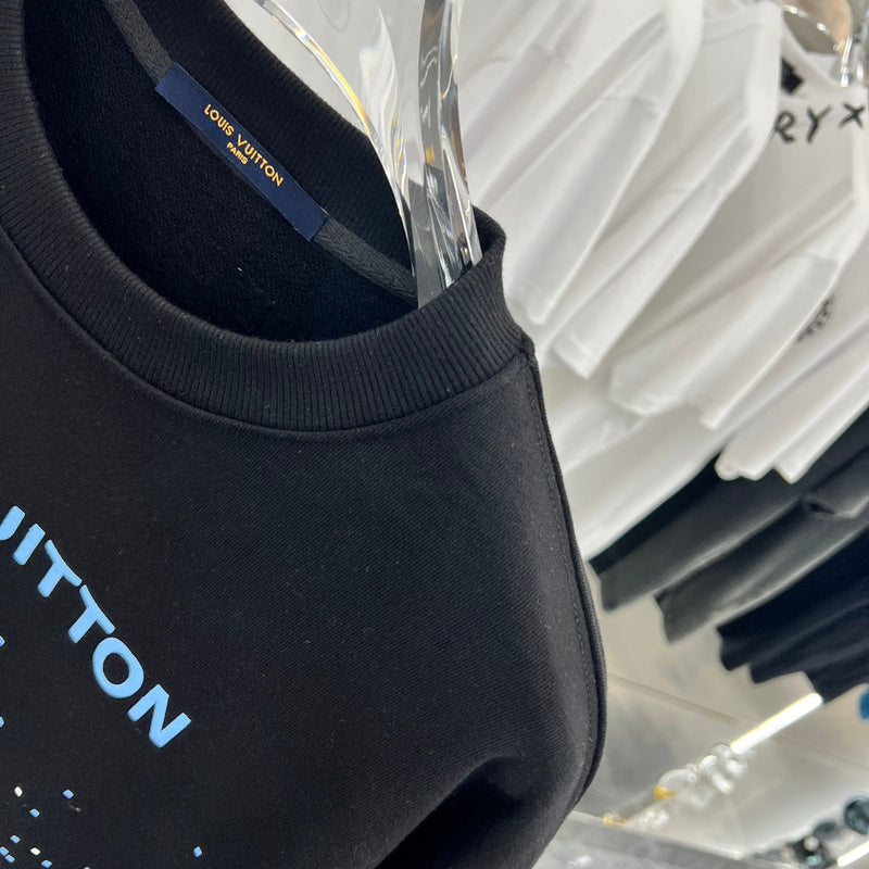 Full styled look of Louis Vuitton luxury clothing with tailored silhouette