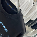 Full styled look of Louis Vuitton luxury clothing with tailored silhouette