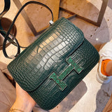 Side view of structured structured handbag
